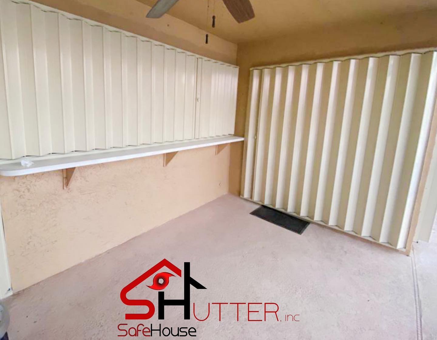 Professional shutter installation team at work