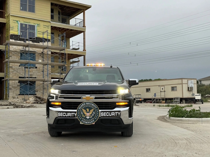 Security guard patrolling commercial property in Austin